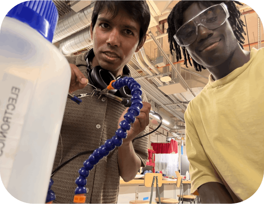 Abba and Saroj building the first Betta prototype in the USC electronics lab